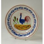 A LLANELLY POTTERY COCKEREL BOWL in the typical fashion sometimes decorated by Sarah Roberts (
