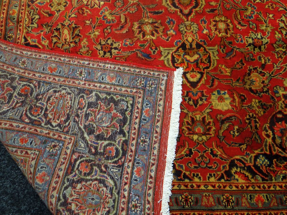 RED GROUND PERSIAN KASHAN CARPET with traditional Kashan medallion design, 294 x 196cms - Image 3 of 3
