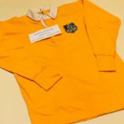AN AUSTRALIA INTERNATIONAL RUGBY SQUAD JERSEY 'Presented by WH Clement, 1975' with plastic No.16