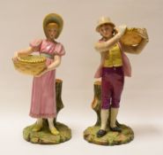 A PAIR OF ROYAL WORCESTER FIGURINE SPILL-HOLDERS of a male and female in pastel glazes and both