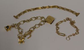 A SMALL PARCEL OF GOLD JEWELLERY believed all 9ct and including charm bracelet (not all charms