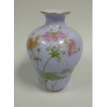 A ROYAL WORCESTER BLUE GLAZED VASE painted with wild-flowers rising upwards, date mark includes