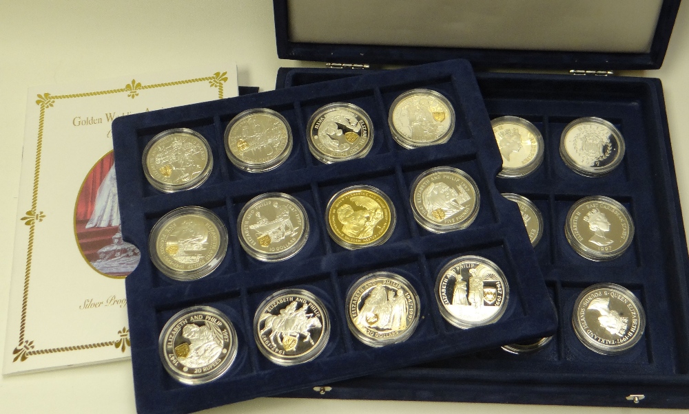 TWENTY-FOUR ROYAL MINT GOLDEN WEDDING ANNIVERSARY COMMEMORATIVE SILVER COMMONWEALTH COINS, with