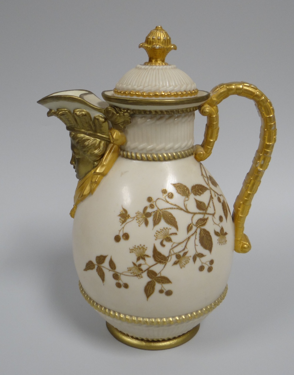 A ROYAL WORCESTER BLUSH LIDDED JUG having a mask head spout, faux bamboo handle and basket weave - Image 2 of 2