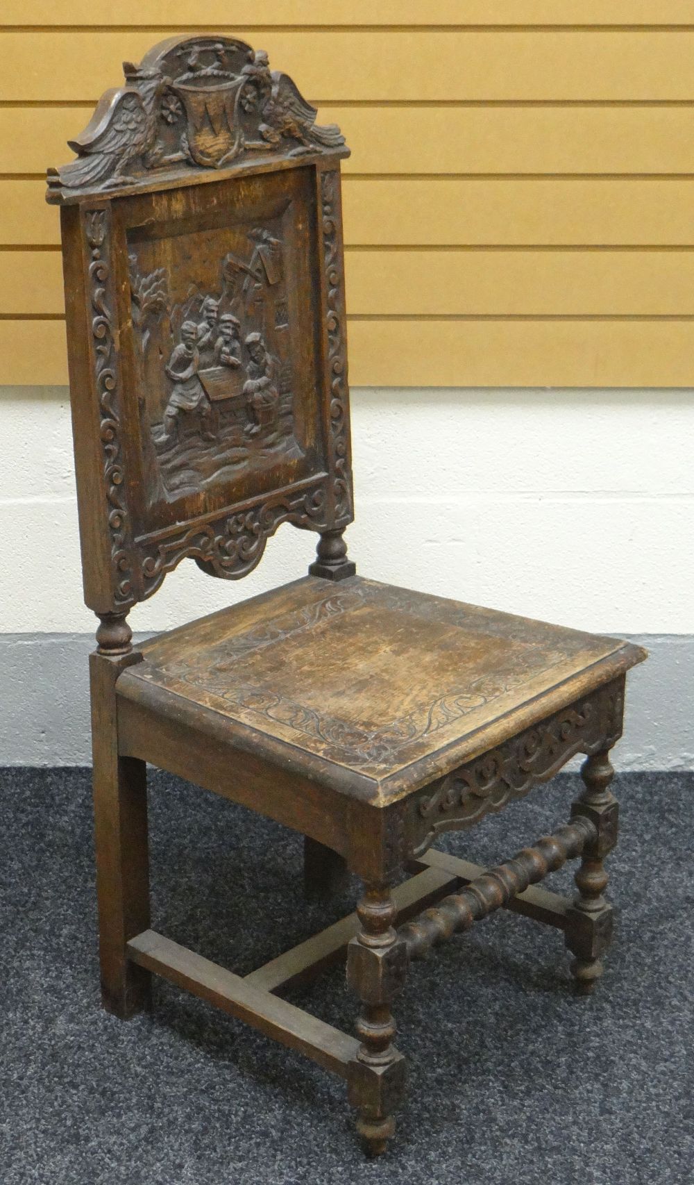 A PAIR OF CARVED OAK TAVERN SCENE CHAIRS with heraldic rails - Image 3 of 3