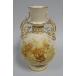 A ROYAL WORCESTER TWIN HANDLED VASE raised on a circular base, with tapered neck to the ovoid body
