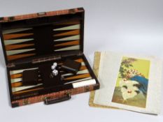 A CASED BACKGAMMON SET & PORTFOLIO OF ORIENTAL PRINTS