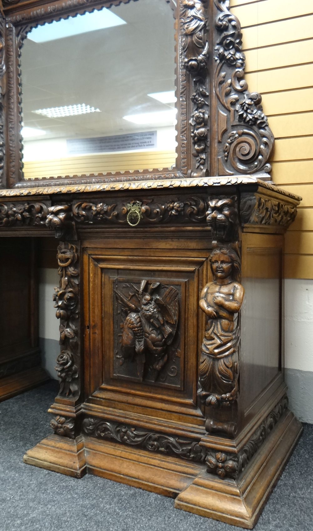 AN IMPOSING OAK MIRROR BACK PEDESTAL SIDEBOARD heavily and impressively carved all-round with - Image 2 of 6