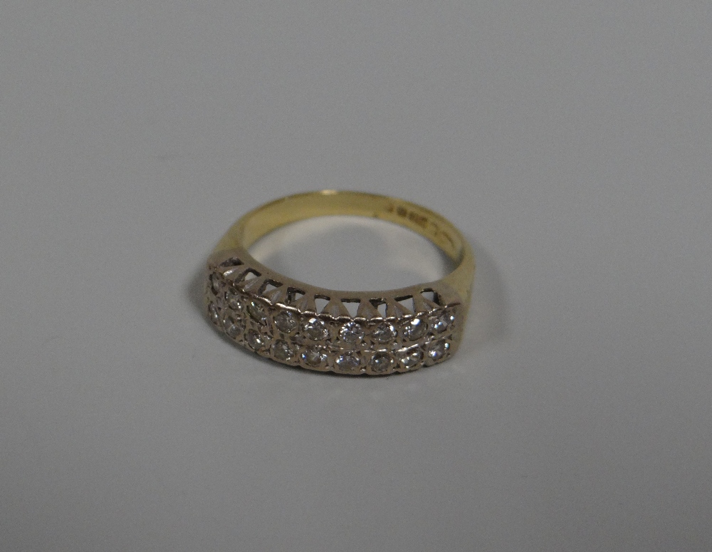 AN 18CT YELLOW GOLD HALF HOOP DIAMOND ETERNITY RING having two rows of nine diamonds each, total