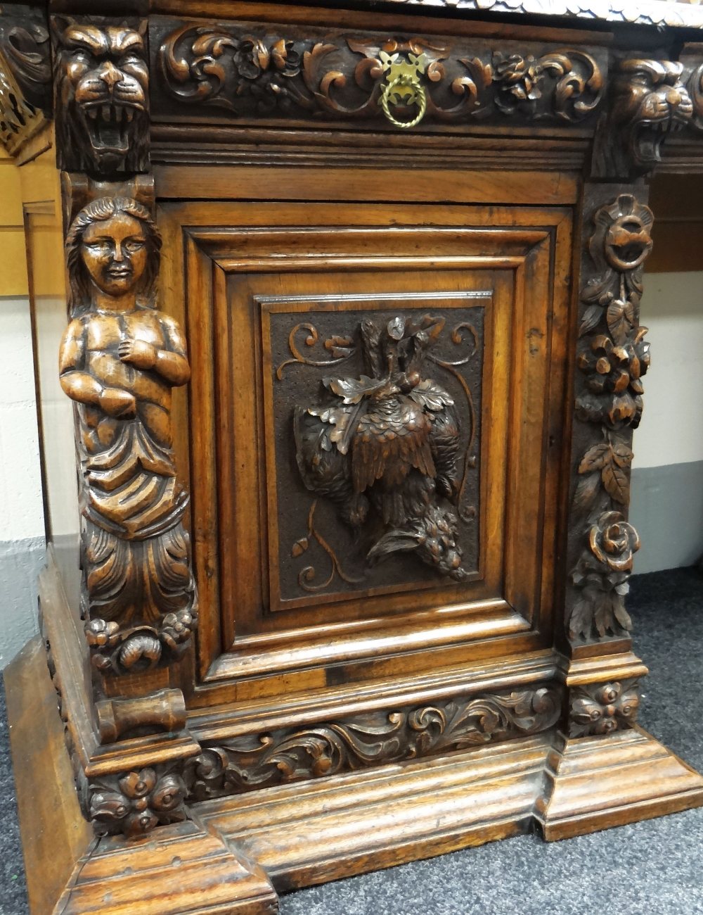 AN IMPOSING OAK MIRROR BACK PEDESTAL SIDEBOARD heavily and impressively carved all-round with - Image 3 of 6