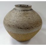 A ST. IVES STYLE STUDIO POTTERY VASE in stoneware with two tone glaze and of ovoid form with