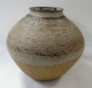 A ST. IVES STYLE STUDIO POTTERY VASE in stoneware with two tone glaze and of ovoid form with