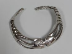 AN ALEXIS KIRK (1936-2010) DESIGNED WHITE METAL AZTEC STYLE HINGING NECKLACE