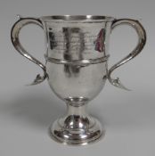 A SILVER TWIN-HANDLED GOBLET, London 1807, 12.5ozs having reeded bands, spreading foot and with