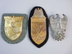 THREE GERMAN THIRD REICH AWARDS to include a 1940 Narvik shield, a Dr Fritz Todt award badge and a
