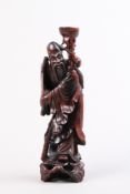 Asiatische Figur.Wohl Konfuzius. Holz geschnitzt. H: 35,5 cm.