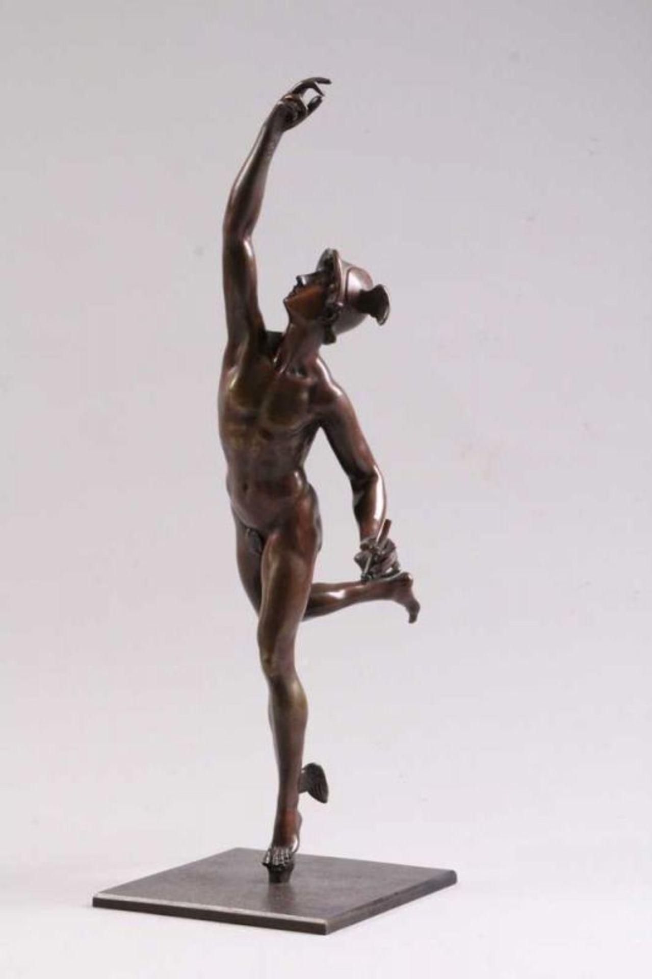 Merkur.Nach 1900. Bronze, dunkle Patina. Tänzerisch nach oben weisender Merkur mit Flügelhelm.