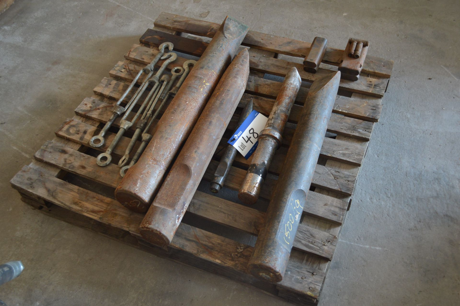 Various Breaker Chisels, as set out on pallet (this lot is located at Collop Gate Farm, Heywood)