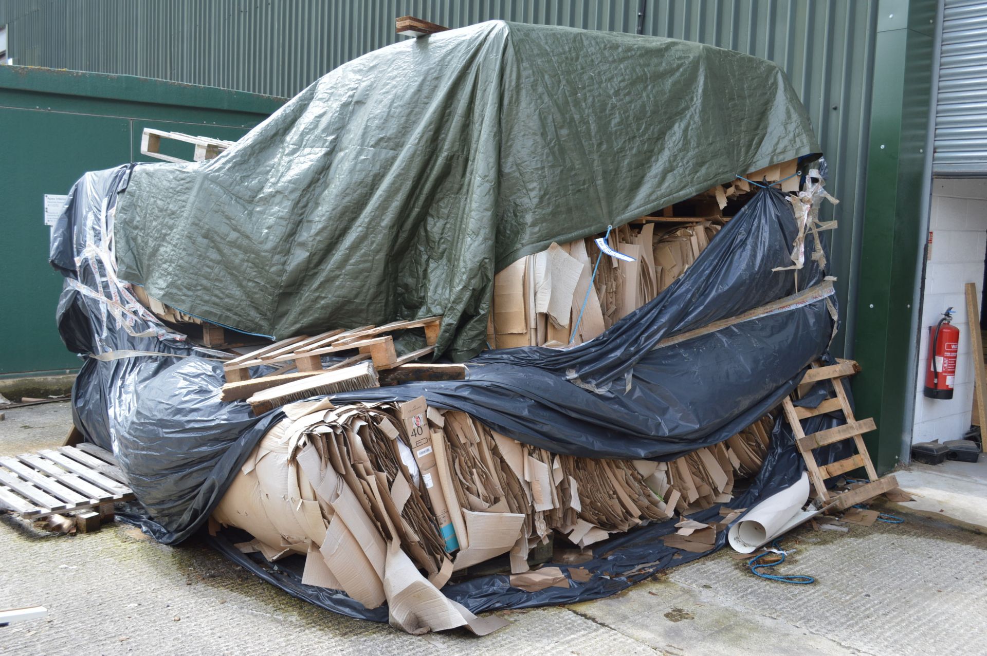 Baled Corrugated Cardboard, as set out in one area