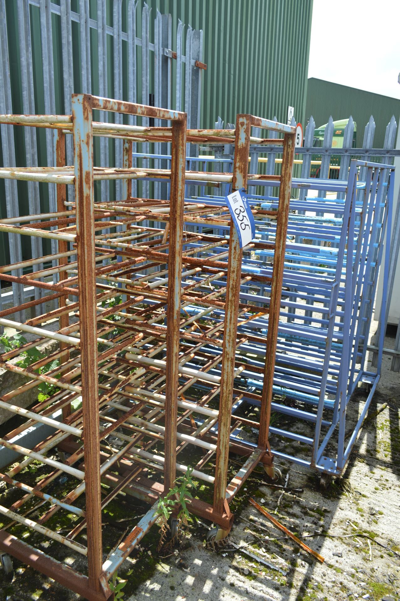 Assorted Multi-Tier Stock Racks, set out in corner