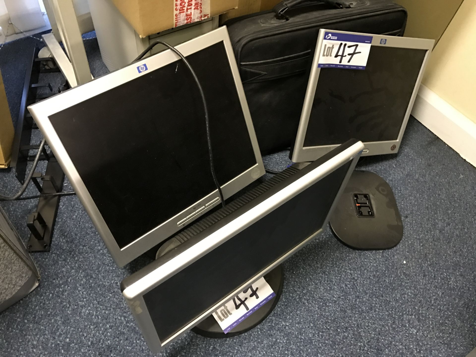 Three assorted Flat Screen Monitors