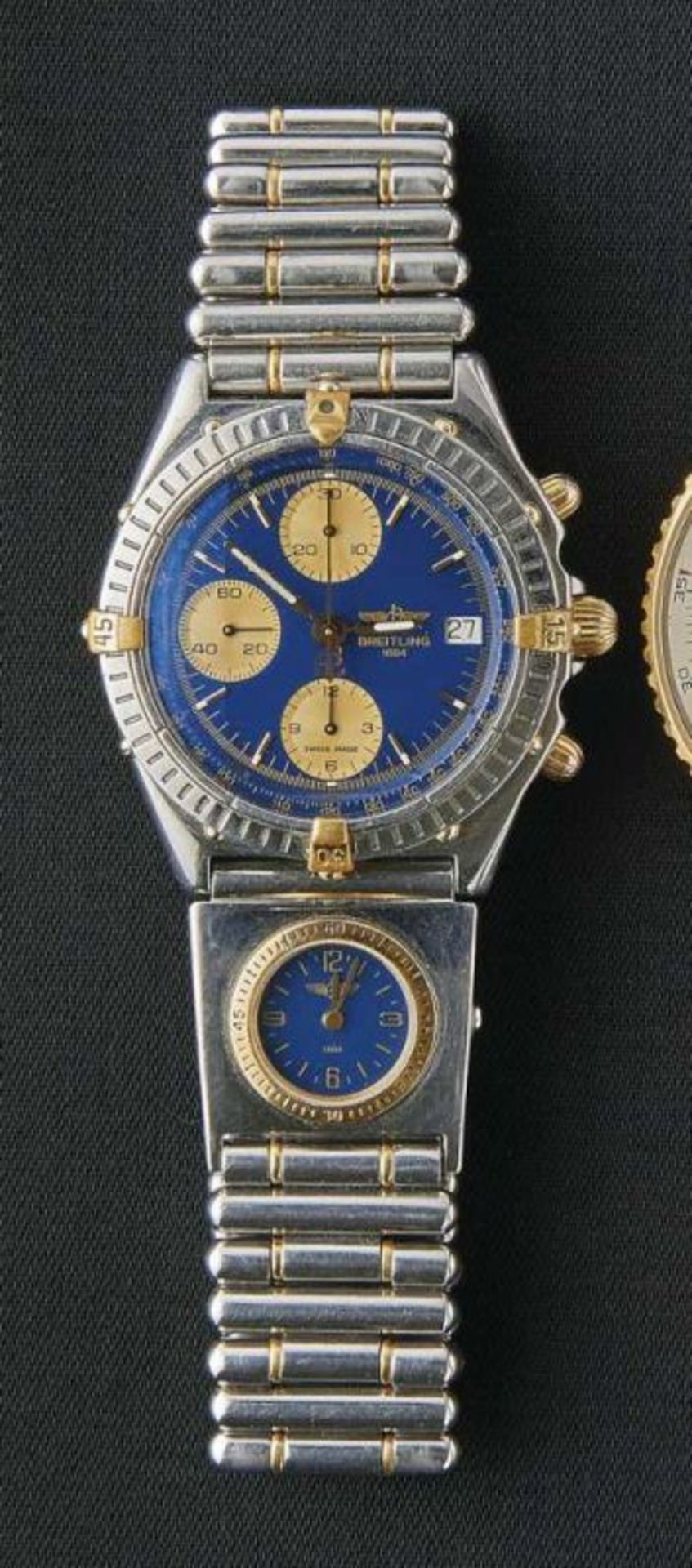 Breitling-Chronomat-Herrenarmbanduhr E. 20. Jh. Rundes Gehäuse mit beweglicher Lünette, blaues