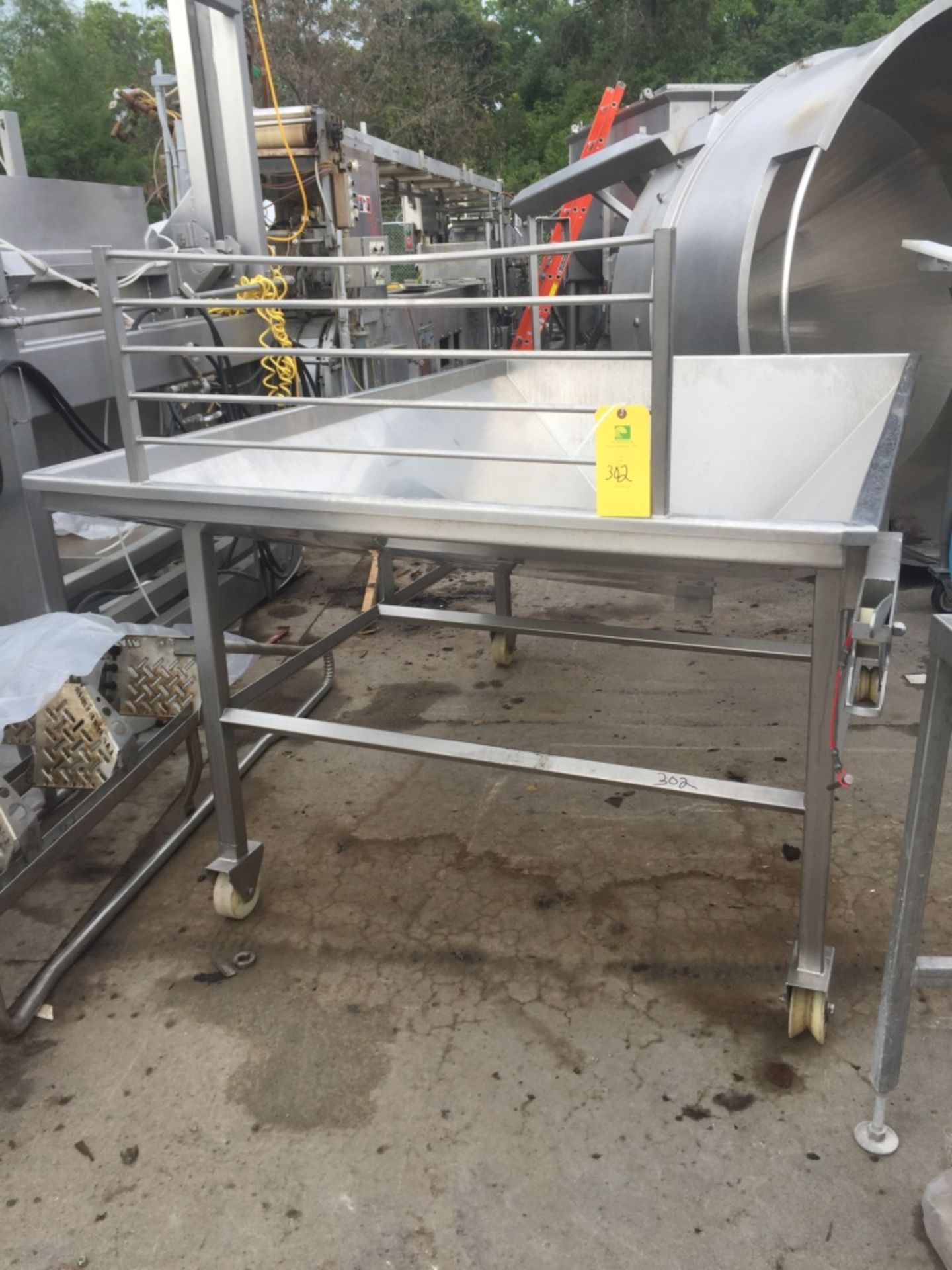 (Located In Columbia MO) Stainless Hopper on Casters Approximate 5' x 9'