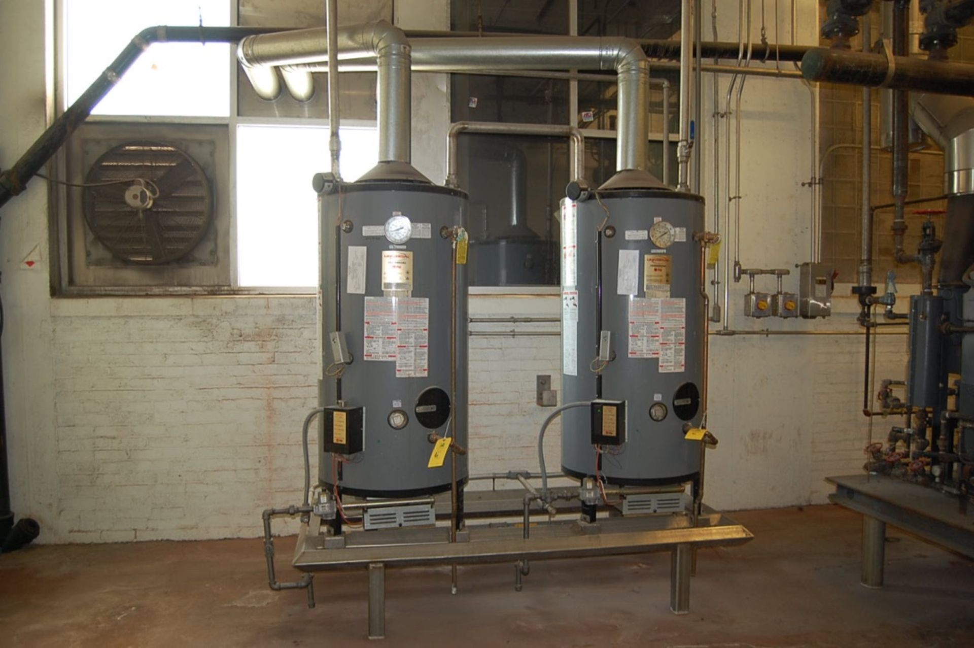 (2) Rheem Rudd Universal Commercial Gas Hot Water Heaters Model #G-100-200 LOADING FEE: $900