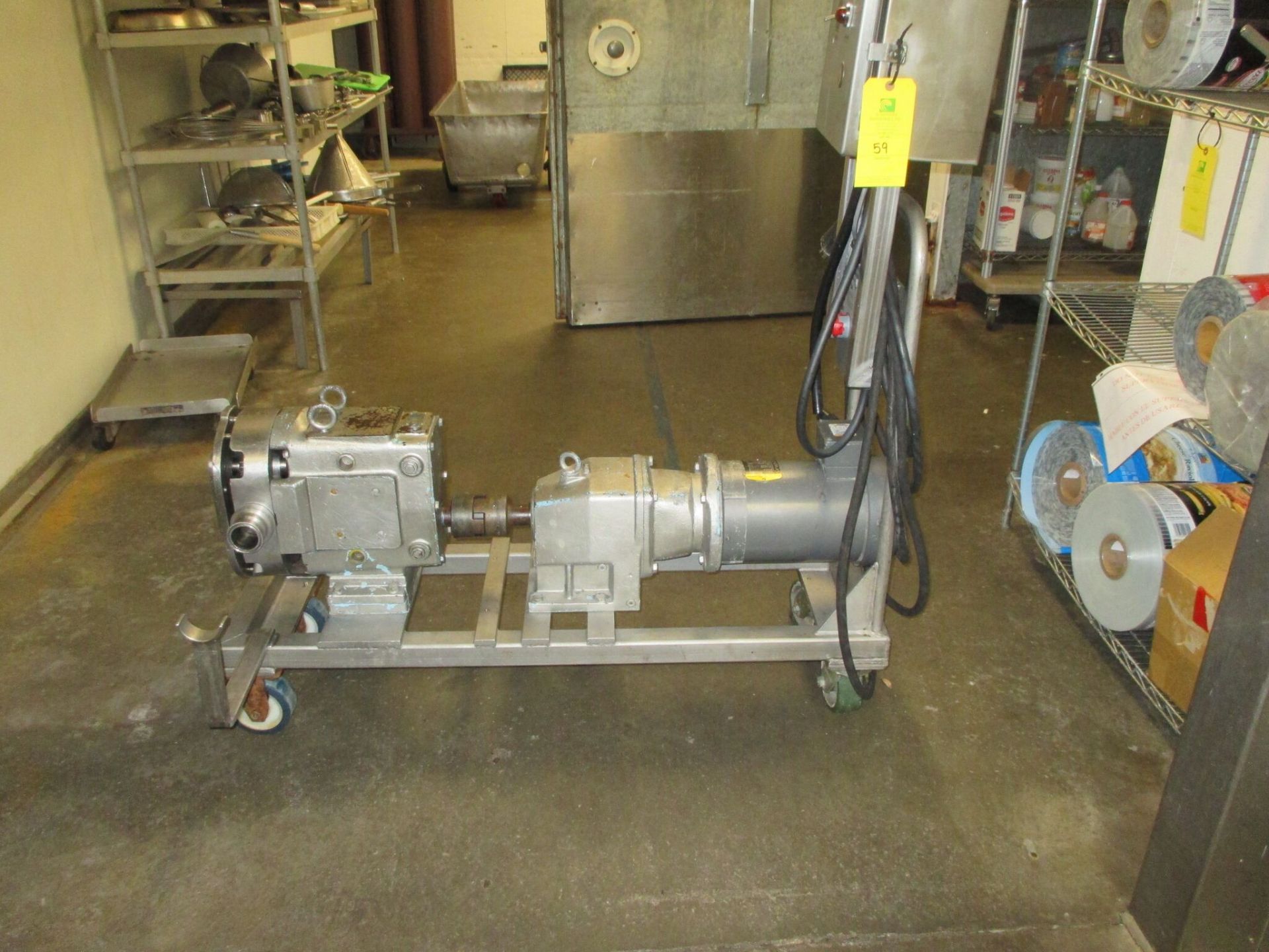 Waukasha Positive Displacement Pump, Motor 5 HP, Serial #33825 Model #060, with portable cart, RIGGI