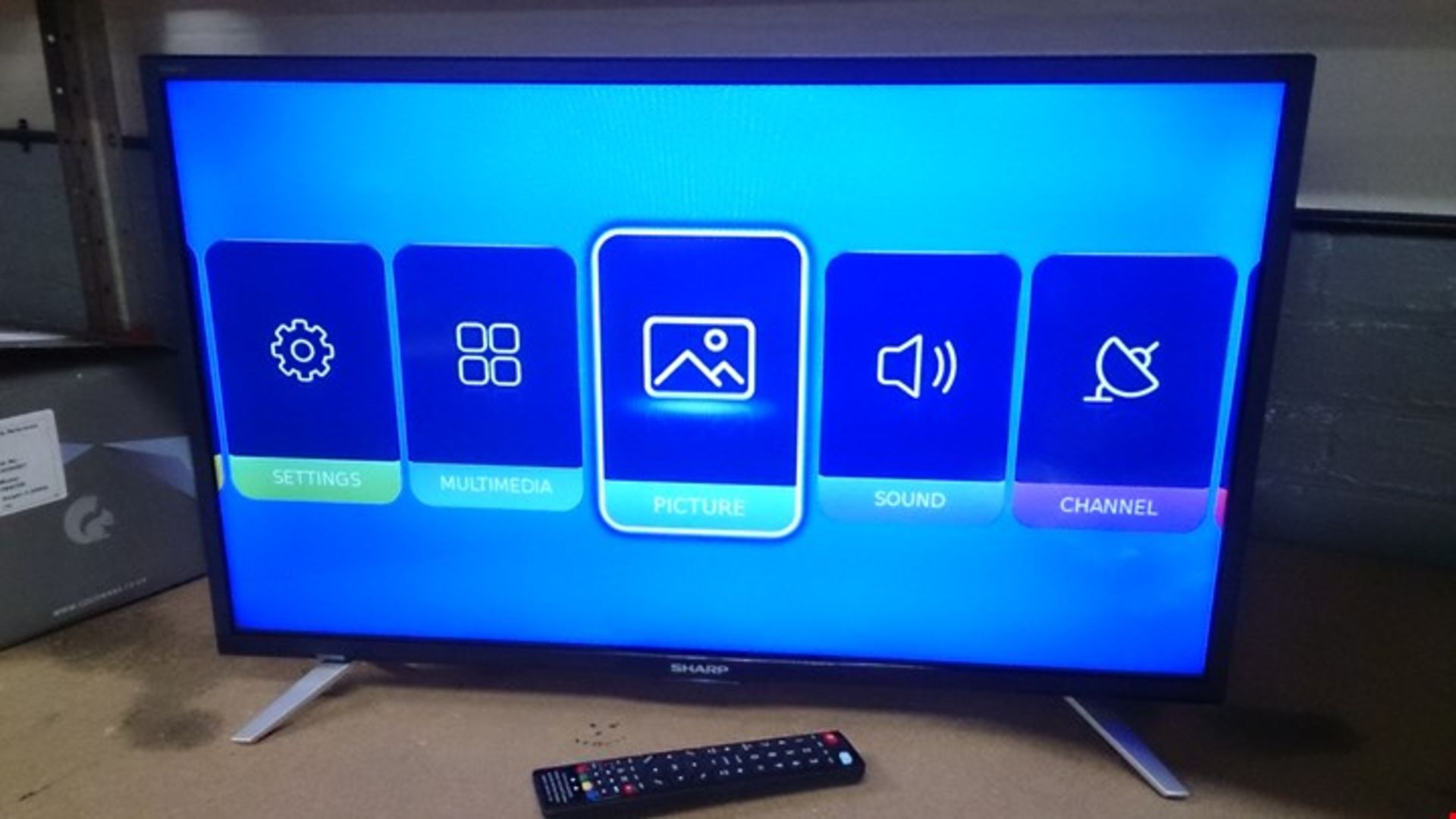 SHARP 32" AQUOS FREEVIEW TELEVISION WITH STAND & REMOTE