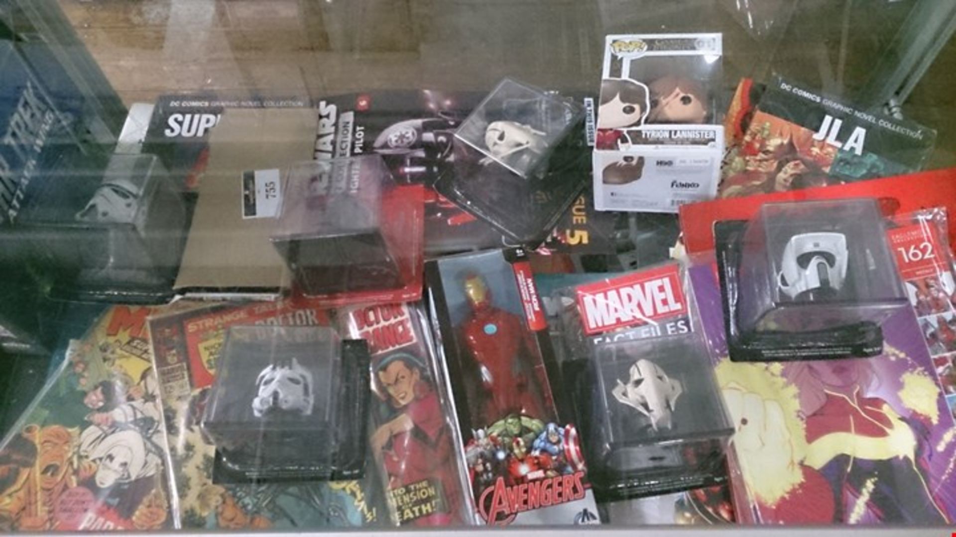 SHELF OF APPROXIMATELY 31 ASSORTED COMICBOOK AND MOVIE ITEMS INC. SSTARWARS HEADS, SUPERMAN, AV...