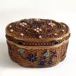 A Chen Xiang Beads in an Embellished Gold Box