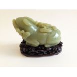 A Yellow Jade 'Mythical Beast' Pendant 19th Century