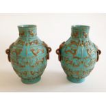 A Pair of Green and Gilt Decorated Vases Qianlong mark 19/20th Century