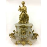 GILDED FRENCH FIGURAL MANTLE CLOCK ON A MARBLE BASE WITH GRIFFINS TO THE SIDES