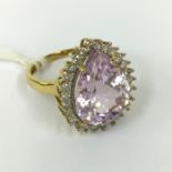 18CT GOLD KUNZITE FROM AFGHANISTAN BEAUTIFULLY PEAR CUT WITH DIAMOND TO THE SURROUND