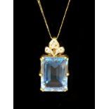 9CT GOLD BLUE TOPAZ PENDANT & CHAIN WITH WHITE TOPAZ ON THE TOP