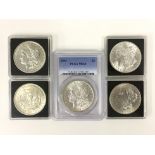 FIVE MORGAN SILVER DOLLARS DATED 1883-1884-1886-1898-1921