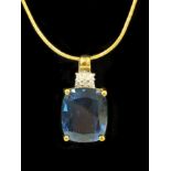 9CT GOLD DIAMOND & BLUE TOPAZ PENDANT WITH CHAIN