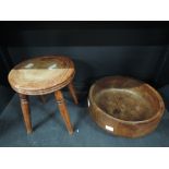A rustic stool and turned wooden fruit bowl