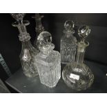 Five cut glass decanters