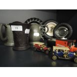A selection of miscellaneous including tyre ashtrays, Wedgwood beaker, tankards and chrome shaving