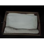 A box of vintage table linen