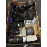 A selection of cameras and accessories including Canon