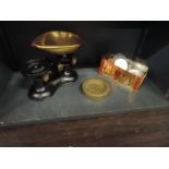 A cast and brass kitchen scale and weights