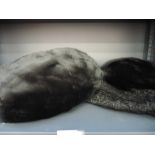 A black fur muff with matched faux fur hat, curly lamb collar and a double stoat fur collar