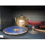 A 19th century agate ware teapot, a cranberry tazza, a 19th century plate and a Cauldon china plate