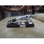 A vintage chrome Jaguar car mascot, presumed 1960's, mounted on later plinth