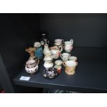 A selection of miniature jugs including Royal Crown Derby, Royal Albert, and other ceramics