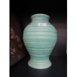 A Carltonware table lamp/vase of green ribbed design, impressed number 1108
